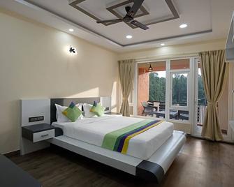 Treebo 3C Comforts - Chikamagalur - Bedroom