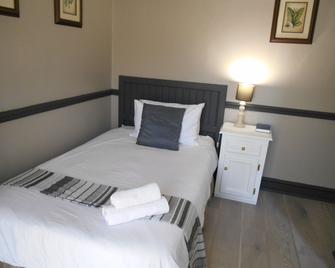 Oakwood Lodge - Bloemfontein - Phòng ngủ