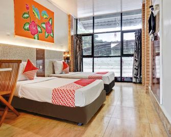OYO 90314 Stadion Guesthouse Syariah - Serang City - Спальня