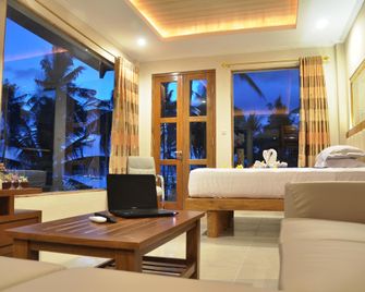 Crystal Beach Bali Hotel - Manggis - Schlafzimmer