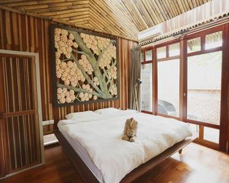 ذا هابي 8 ريتريت آت باسير بوتيه - إيبوه - غرفة نوم