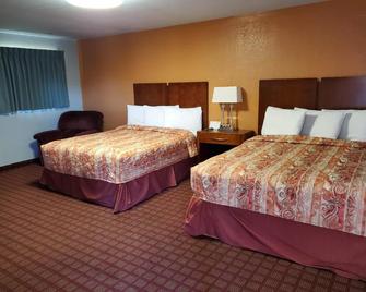 Economy Inn - Pratt - Спальня