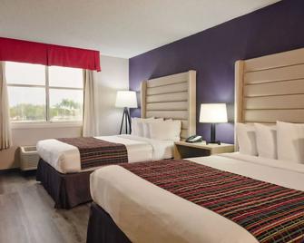 The Palms Inn & Suites - Miami - Schlafzimmer