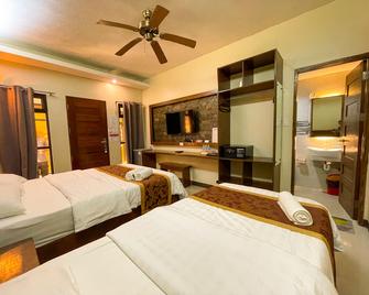 Casa Marco Suites Puerto Galera - Puerto Galera - Camera da letto