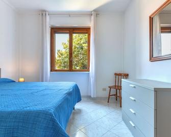 Appartamento Cassiopea - Porto Azzurro - Chambre