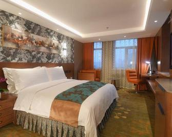 Spring Hotel - Dalian - Habitación