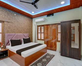 Gulab Residency Home Stay - ורנאסי - חדר שינה