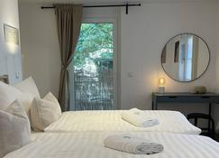 Stylische Wohnung im Herzen von Bregenz mit privatem Parkplatz - Bregenz - Bedroom