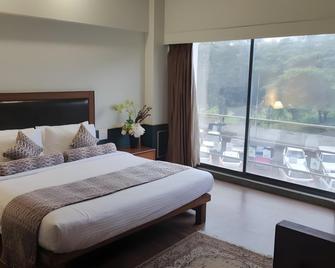 Krishna Inn - Kolhapur - Habitación