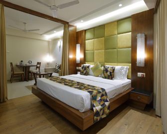 Hotel Accolade - Ahmedabad - Slaapkamer