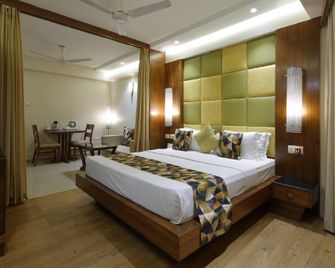 Hotel Accolade - אחמדאבאד - חדר שינה