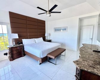 Negril Ocean Front, Beach, Pool Free Wifi, A/C, Outdoor Kitchen,Dining,Hot Tub. - Negril - Bedroom