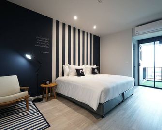 Blu Monkey Hub and Hotel Chanthaburi - צ'אנטאבורי - חדר שינה