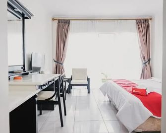 RedDoorz Plus near Pelabuhan Merak - Cilegon - Slaapkamer