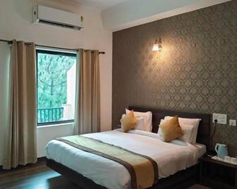Pineland Resorts & Chalets Kasauli - 格紹利 - 臥室