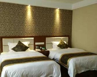 Qingtian Boutique Hotel (Zhaotong Fengxia Road) - Zhaotong - Habitación