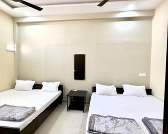 Goroomgo Rudrasagar Homestay Ujjain - Ujjain - Habitación