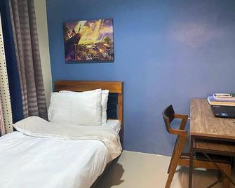 Charming 2-bedroom bungalow in nice Kabankalan City with AC - Kabankalan - Bedroom