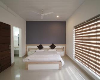 Himani Heritage - Madikeri - Schlafzimmer