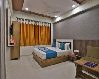 Hotel O Galaxy - Ahmedabad - Habitación