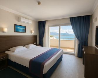 Doruk Hotel & Suits - Icmeler - Makuuhuone