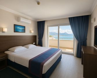 Doruk Hotel & Suits - İçmeler - Phòng ngủ