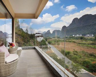 Baiyue Mountain Outdoor Resort Hotel - Guilin - Balcony