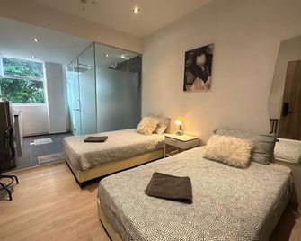 International Service Apartments - Singapur - Schlafzimmer