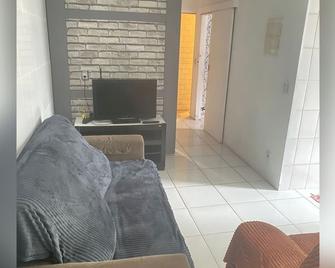 Simples Porém Aconchegante! A 6 min da Praia e Aceita pet - Sao Vicente (Brésil) - Salon