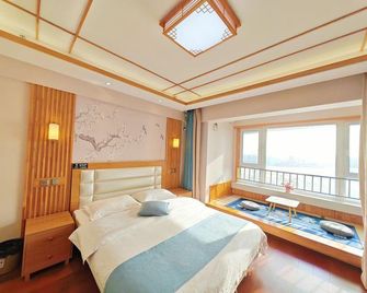Dalian Boting Serviced Apartment (Shibeiwan Dream Water Park) - Dalian - Bedroom