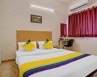 Itsy Hotels Flowers Park - Nashik - Slaapkamer
