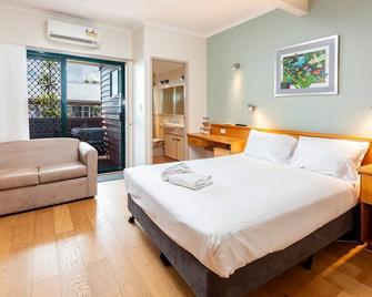 Boat Harbour Apartments Studio - Urangan - Спальня