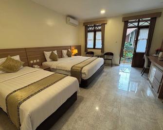 Ahadiat Hotel & Bungalow - באנדונג - חדר שינה