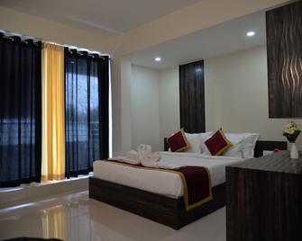 Hotel Amber Castle - Hassan - Bedroom