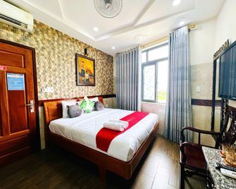 Hoang Thanh Thuy 4 Hotel - Ciudad Ho Chi Minh - Habitación