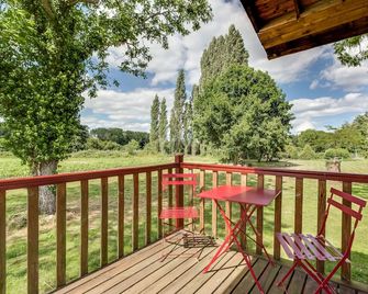 Roulotte à la Ferme de l'Isle - Avaray - Balkon