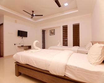 Chandra Inn - Kollam - Bedroom