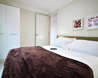 Bombinhas Summer Beach Hotel & Spa - Bombinhas - Schlafzimmer