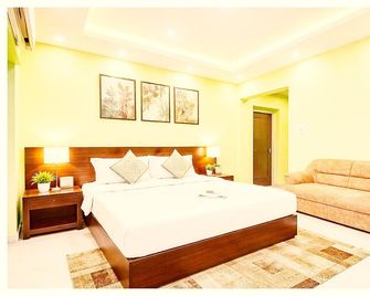H R Guest House - Varanasi - Makuuhuone