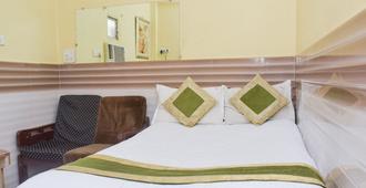Hotel Nirmal Lodging - Bombay - Habitación