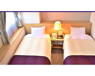 Takasaki Urban Hotel - Takasaki - Κρεβατοκάμαρα