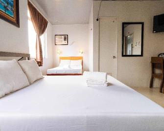 Getz Hotel - Manila - Habitación
