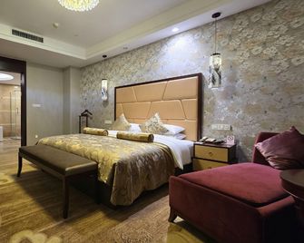 Linyi Hotel (Development Zone) - Linyi - Bedroom