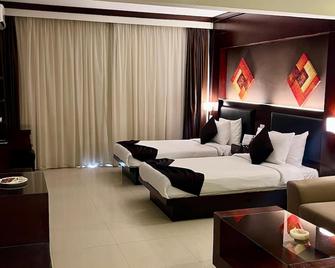 Panacea Suites Hotel - Borg El Arab - Habitación