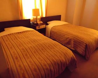 Business Green Hotel Hino - Hino - Bedroom