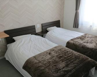 108 Twin room / Kasai-gun Hokkaidō - Sarabetsu - Bedroom