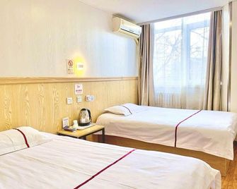 Weiqingxuan Motel - Tianjin - Schlafzimmer