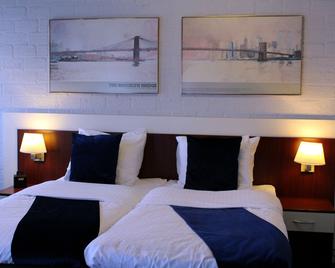 Apollo Hotel - Nijmegen - Slaapkamer