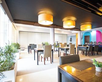 Empire Suites Hotel - Puerto Princesa - Restaurant