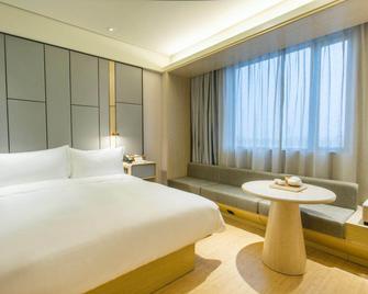 Ji Hotel Suzhou Guanqian Street Le Bridge Metro Station - Suzhou - Bedroom